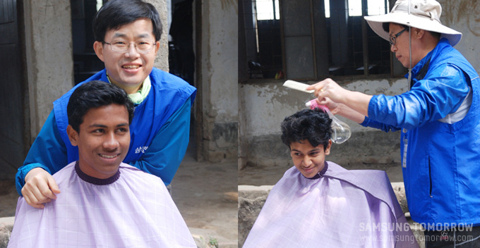 이발봉사를 하는 박배선 대리, 정세헌 차장