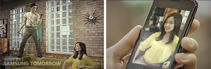 스마트폰으로 여자의 사진을 찍는 남자