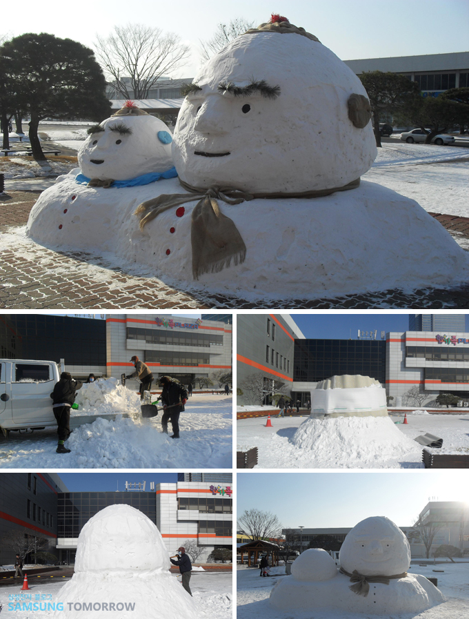 어깨동무한 대형 눈사람 형제
