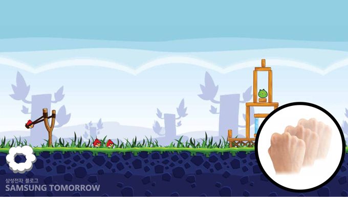 당기는 모양의 주먹쥔 손