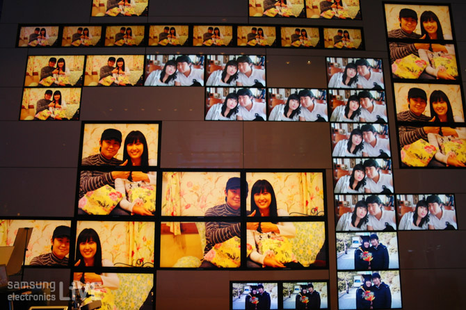 왼쪽 캡쳐월 82대 모니터에 가득한 두 사람의 사진