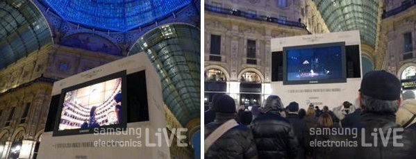 오프닝공연을 전광판의 영상으로 보는 사람들