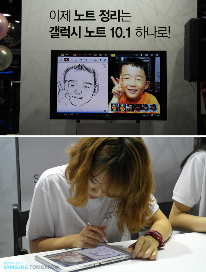 갤럭시노트10.1로 아이를 그리는 모습
