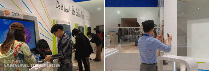 부스를 설치하는 분주한 사람들