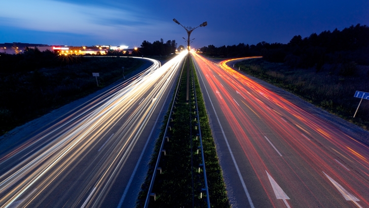 Light trails of evening highway
